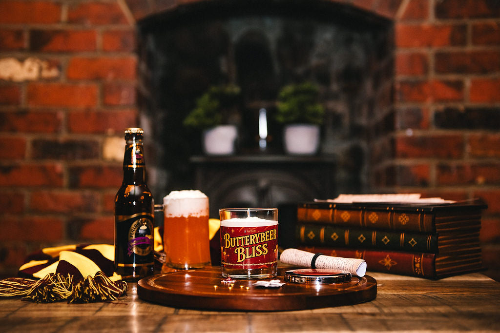 Butterbeer Bliss candle in a warn tavern atmosphere