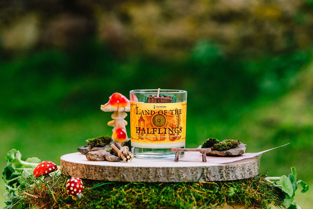 Land of the Halflings fantasy candle styled with moss mushrooms and woodland props