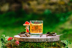 Land of the Halflings fantasy candle styled with moss mushrooms and woodland props