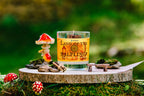 Fantasy candle featuring miniature hobbit door wax topper detail