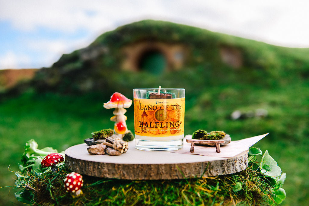 Shire inspired fantasy candle with countryside green hills aesthetic