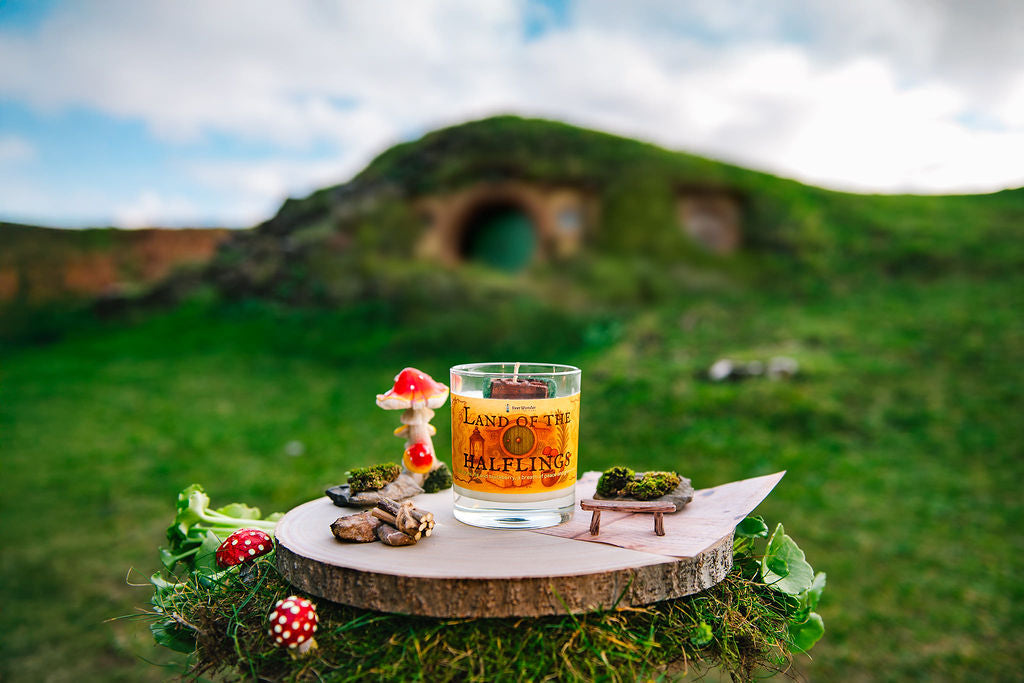 Shire inspired countryside fantasy candle with hobbit house wax topper