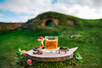 Shire inspired countryside fantasy candle with hobbit house wax topper